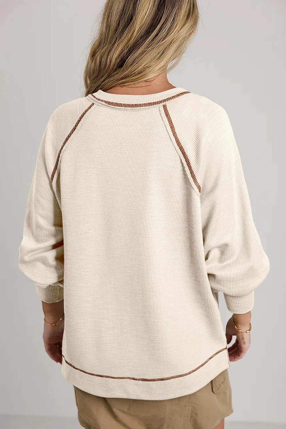 Exposed Seam Textured Knit V Neck Pullover Top